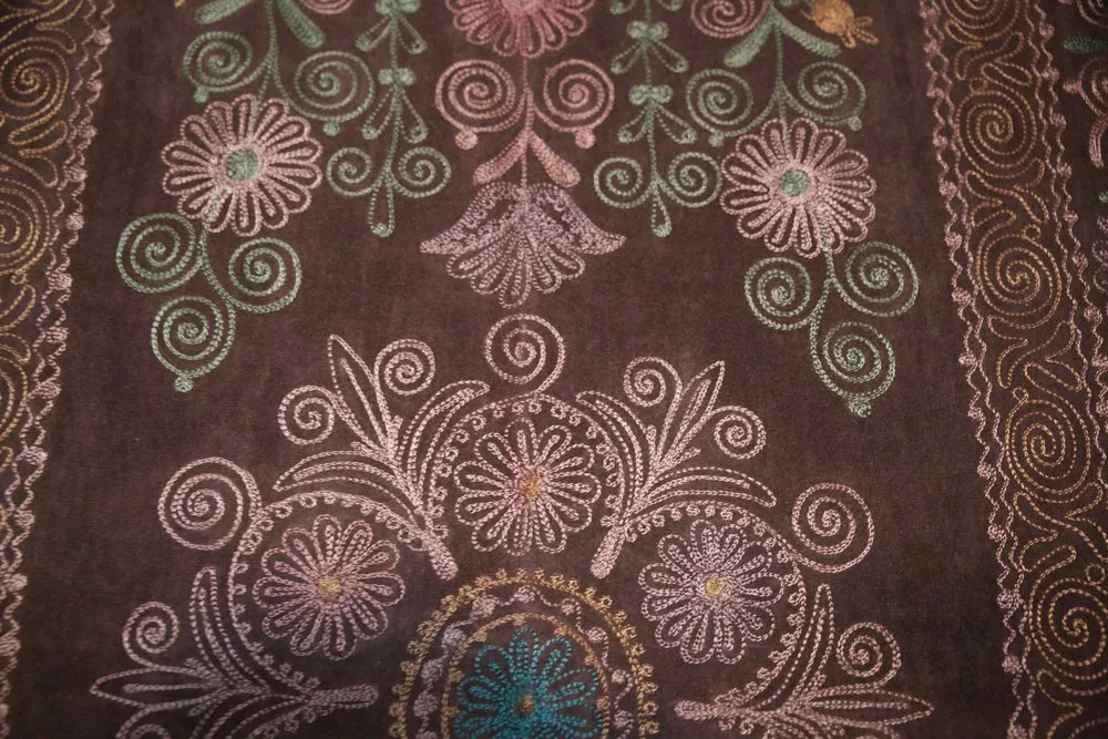 Vintage velvet Suzani throw in coffee